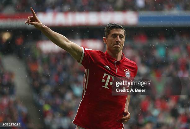 Robert Lewandowski of FC Bayern Muenchen celebrates his first goal during the Bundesliga match between Bayern Muenchen and FC Ingolstadt 04 at...