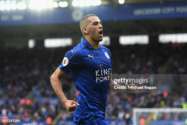 Islam Slimani of LeicesterCity celebrates scoring his sides first goal during the Premier League match between Leicester City and Burnley at The King...