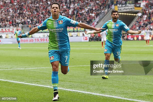 Javier Hernandez of Leverkusen celebrates his team's first goal with team mate Kevin Volland during the Bundesliga match between Eintracht Frankfurt...
