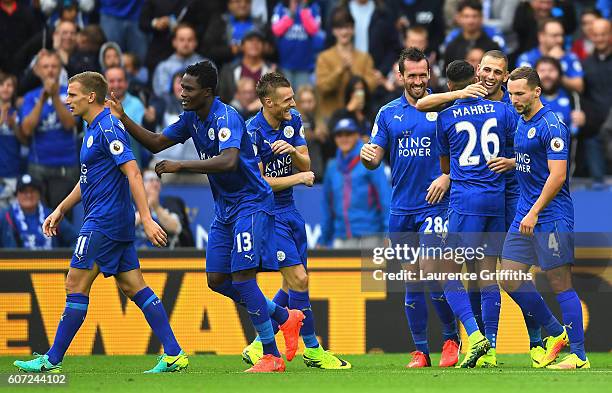 Islam Slimani of Leicester City celebrates scoring his sides second goal with his team mates during the Premier League match between Leicester City...