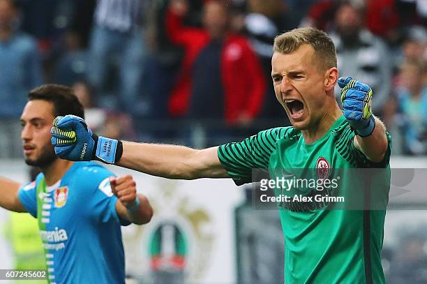 Goalkeeper Lukas Hradecky of Frankfurt reacts after saving a penalty from Javier Hernandez of Leverkusen during the Bundesliga match between...