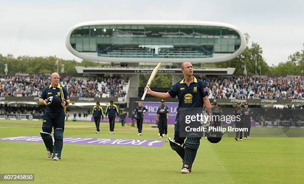 Jonathan Trott and Tim Ambrose of Warwickshire leave the field after winning the Royal London one-day cup final cricket match between Warwickshire...