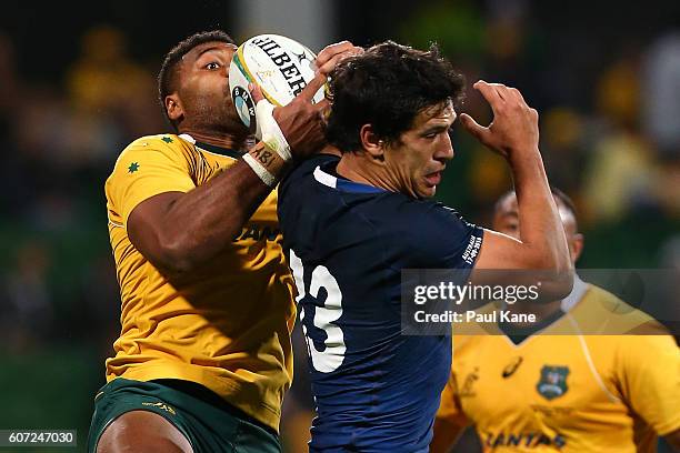 Samu Kerevi of Australia catches the ball against Matias Moroni of Argentina during the Rugby Championship match between the Australian Wallabies and...