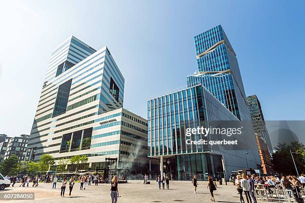 modern office buildings in amsterdam. - zuidas stockfoto's en -beelden