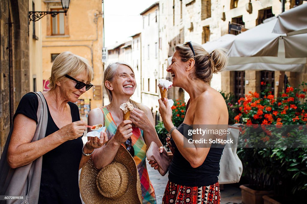 Female Friends Enjoying Italian Ice-Cream