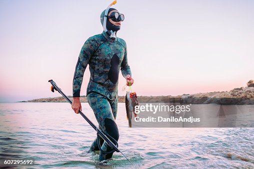 1,317 Spear Fishing Stock Photos, High-Res Pictures, and Images