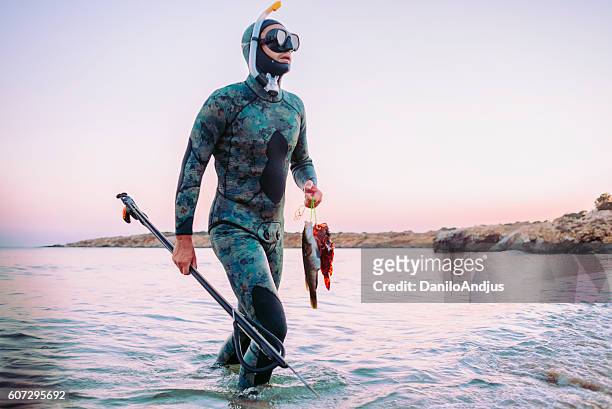1,316 Spear Fishing Stock Photos, High-Res Pictures, and Images