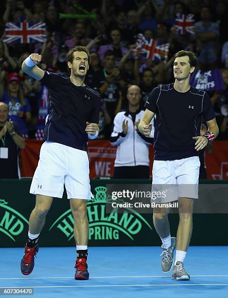 Andy Murray and Jamie Murray of Great Britain celebrate their four set victory against Juan Martin Del Potro and Leonardo Mayer of Argentina in their...