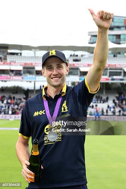 Chris Woakes of Warwickshire celebrates after winning the Royal London One-Day Cup Final after beating Surrey at Lord's Cricket Ground on September...