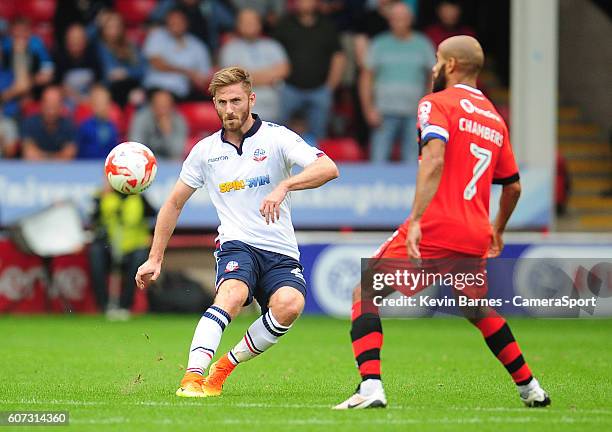 Bolton Wanderers' James Henry under pressure from Walsall's Adam Chambers during the Sky Bet League One match between Walsall and Bolton Wanderers at...