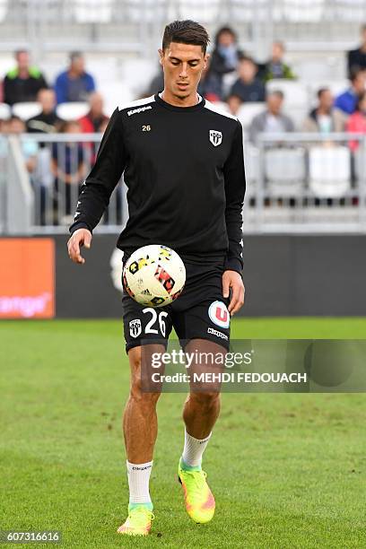 Angers' defender Mehdi Tahrat warms up before the French L1 footbal match Bordeaux vs Angers on September 17, 2016 at the Matmut Stadium in Bordeaux...