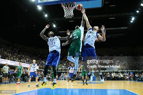 Mathias Lessort of Nanterre and Perry jones III and Sergey Monya of Khimki Moscow during the match for the 3rd and 4th place between Nanterre and...