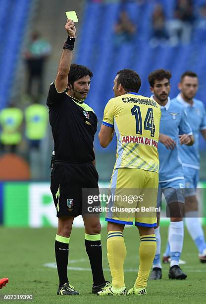 Referee Fabio Maresca shows yellow card to Hugo Campagnaro of Pescara Calcio during the Serie A match between SS Lazio and Pescara Calcio at Stadio...