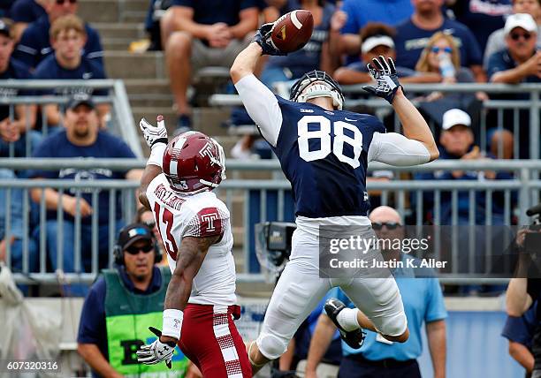 Mike Gesicki of the Penn State Nittany Lions makes a catch against Nate L. Smith of the Temple Owls in the second half during the game on September...