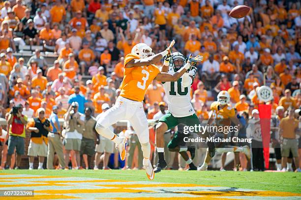 Wide receiver Josh Malone of the Tennessee Volunteers attempts to catch a pass in front of cornerback Randy Stites of the Ohio Bobcats at Neyland...