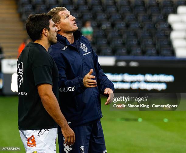 Coach Marius Goosen of Benetton Treviso, with Edoardo Gori during the Guinness PRO12 Round 3 match between Ospreys and Benetton Rugby Treviso at...