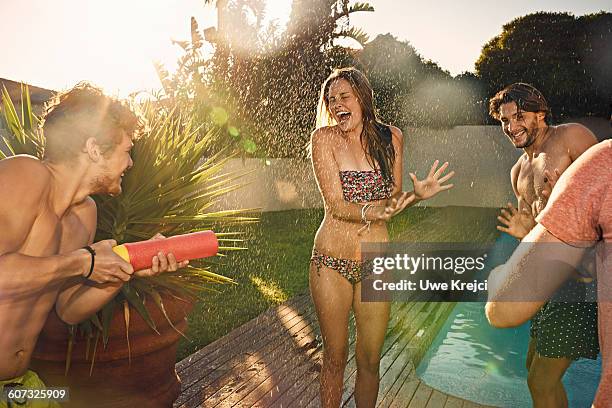 friends having fun - friend mischief stock pictures, royalty-free photos & images