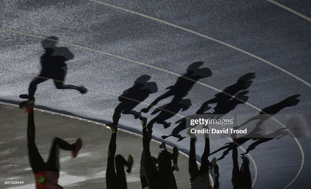 Shadows of a group of runners
