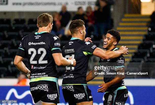 Keelan Giles of Ospreys celebrates scoring his sides seventh try during the Guinness PRO12 Round 3 match between Ospreys and Benetton Rugby Treviso...