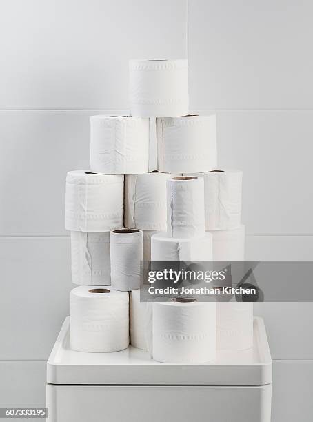 toilet roll stack 1 - toilet paper stock pictures, royalty-free photos & images