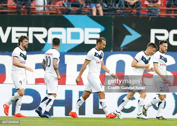 Nicolas Tripichio of Velez Sarsfield celebrates with his teammates after scoring the first goal of his team during a match between San Lorenzo and...