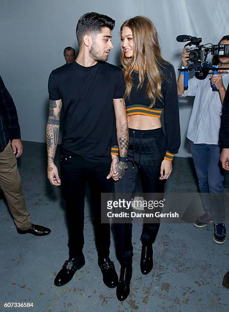 Zayn Malik and Gigi Hadid attend the Versus Versace show during London Fashion Week Spring/Summer collections 2016/2017 on September 17, 2016 in...