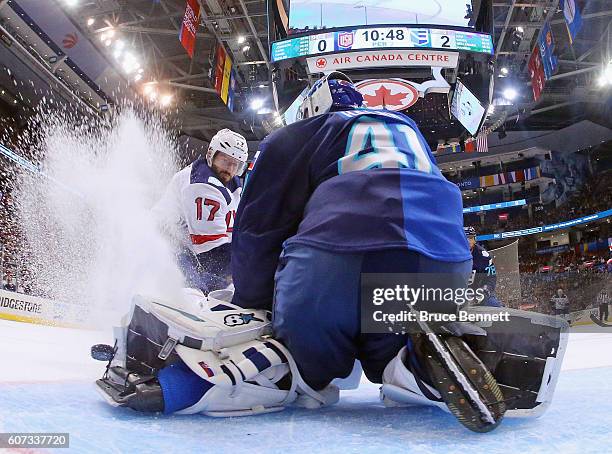 Jaroslav Halak of Team Europe makes the kick save on Ryan Kesler of Team USA during the second period during the World Cup of Hockey tournament at...