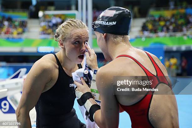 Jessica Long of the United States is congratulated by her team mate Mallory Weggemann of the United States after winning the gold medal in the...