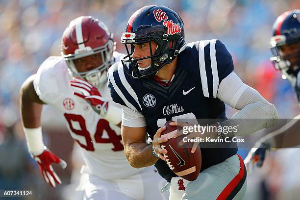 Chad Kelly of the Mississippi Rebels rushes against the Alabama Crimson Tide at Vaught-Hemingway Stadium on September 17, 2016 in Oxford, Mississippi.