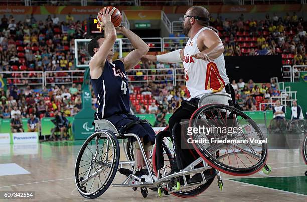 Michael Paye of USA and Asier Garcia of Spain in action during Men's Wheelchair Basketball Gold Medal match between Spain and USA on day 10 of the...