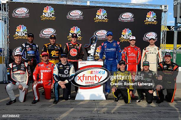 Darrell Wallace Jr, driver of the TMNT Shredder Ford, Brendan Gaughan, driver of the American Ethanol/Thorntons Chevrolet, Ty Dillon, driver of the...
