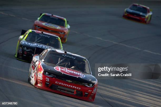 Ty Dillon, driver of the Rheem Chevrolet, leads a pack of cars during the NASCAR XFINITY Series Drive for Safety 300 at Chicagoland Speedway on...