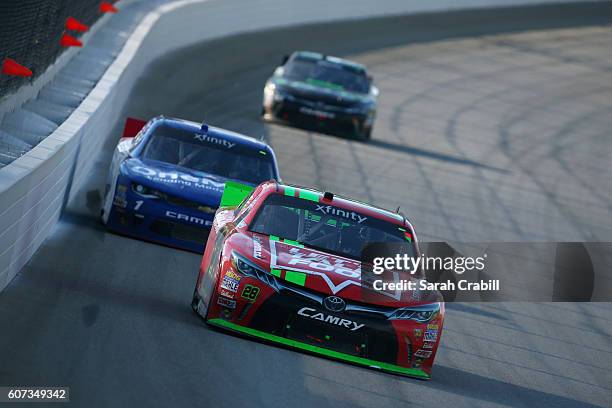 Dakoda Armstrong, driver of the Let'sTalkFood.com Toyota, leads Elliott Sadler, driver of the OneMain Chevrolet, during the NASCAR XFINITY Series...