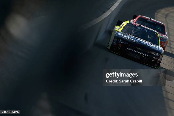 Paul Menard, driver of the Richmond/Menards Chevrolet, races during the NASCAR XFINITY Series Drive for Safety 300 at Chicagoland Speedway on...