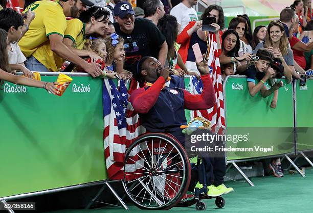 Matt Scott of USA celebrates winning the gold medal after the Men's Wheelchair Basketball Gold Medal match between Spain and USA at Olympic Arena on...