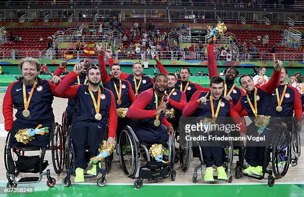 Gold medalist USA celebrate on the podium at the medal ceremony after the Men's Wheelchair Basketball Gold Medal match between Spain and USA at...