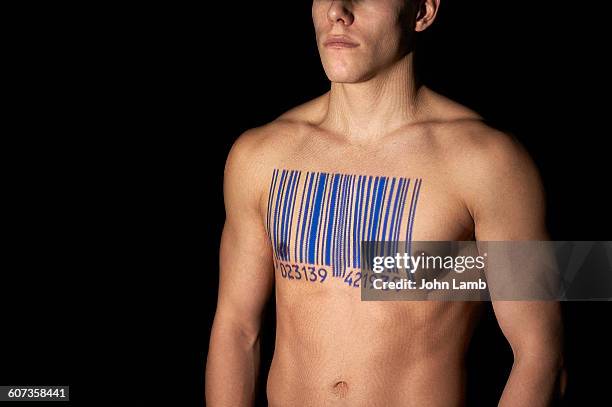 bar coded male - human trafficking stock pictures, royalty-free photos & images