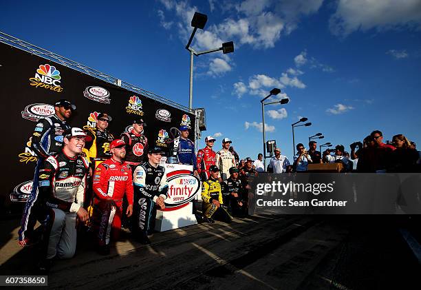 Darrell Wallace Jr, driver of the TMNT Shredder Ford, Brendan Gaughan, driver of the American Ethanol/Thorntons Chevrolet, Ty Dillon, driver of the...