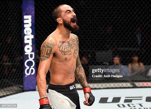Jose Quinonez of Mexico yells after facing Joey Gomez in their bantamweight bout during the UFC Fight Night event at State Farm Arena on September...