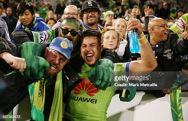 Joseph Tapine of the Raiders celebrates with fans after victory in the second NRL Semi Final match between the Canberra Raiders and the Penrith...