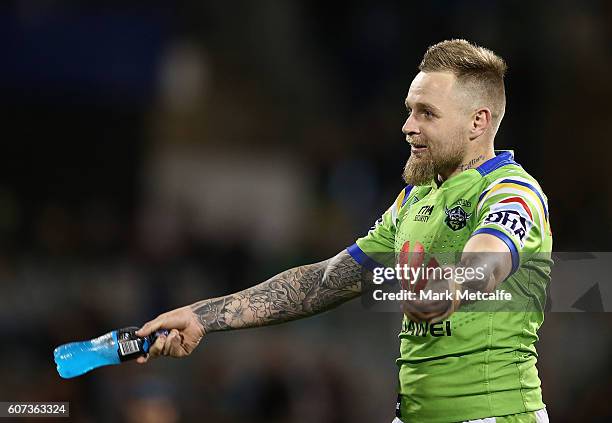 Blake Austin of the Raiders celebrates victory in the second NRL Semi Final match between the Canberra Raiders and the Penrith Panthers at GIO...