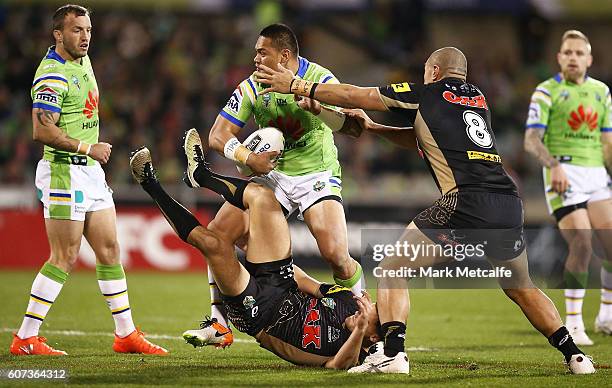 Joseph Leilua of the Raiders breaks a tackle during the second NRL Semi Final match between the Canberra Raiders and the Penrith Panthers at GIO...