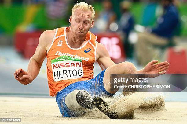 Holland's Ronald Hertog competes and finishes second during the long jump final at the Olympic stadium at the RIO2016 Paralympic Games in Rio de...
