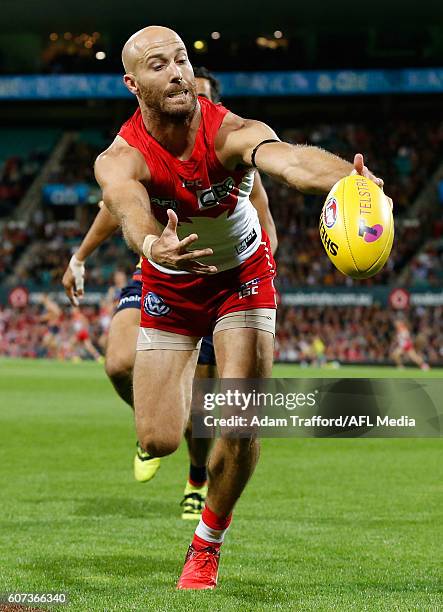 Jarrad McVeigh of the Swans in action ahead of Eddie Betts of the Crows during the 2016 AFL First Semi Final match between the Sydney Swans and the...