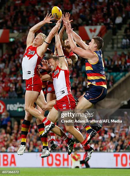 Josh Jenkins of the Crows competes for the ball with Isaac Heeney, Jeremy Laidler and Sam Naismith of the Swans during the 2016 AFL First Semi Final...
