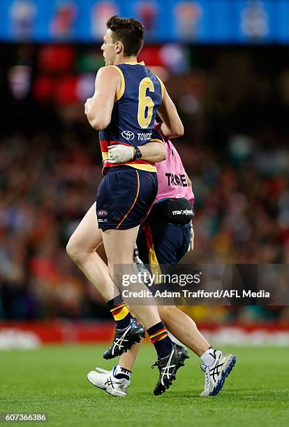 Jake Lever of the Crows is seen injured during the 2016 AFL First Semi Final match between the Sydney Swans and the Adelaide Crows at the Sydney...