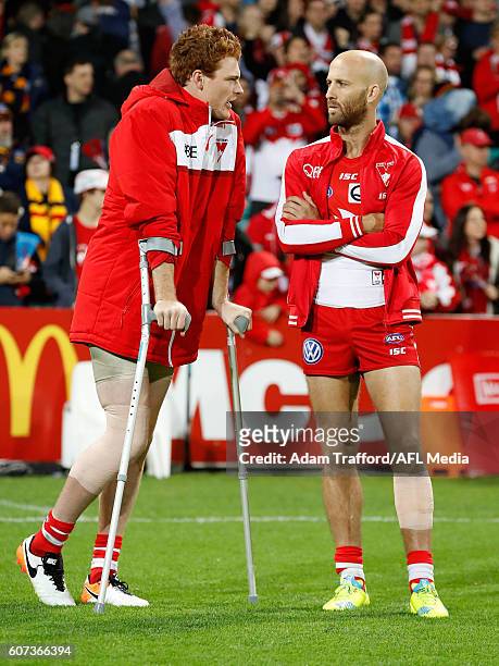 Gary Rohan of the Swans chats to Jarrad McVeigh of the Swans during the 2016 AFL First Semi Final match between the Sydney Swans and the Adelaide...