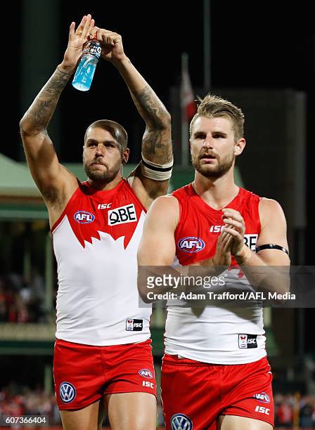 Lance Franklin and Harry Marsh of the Swans thank fans during the 2016 AFL First Semi Final match between the Sydney Swans and the Adelaide Crows at...