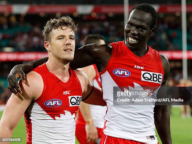 Luke Parker and Aliir Aliir of the Swans celebrate during the 2016 AFL First Semi Final match between the Sydney Swans and the Adelaide Crows at the...