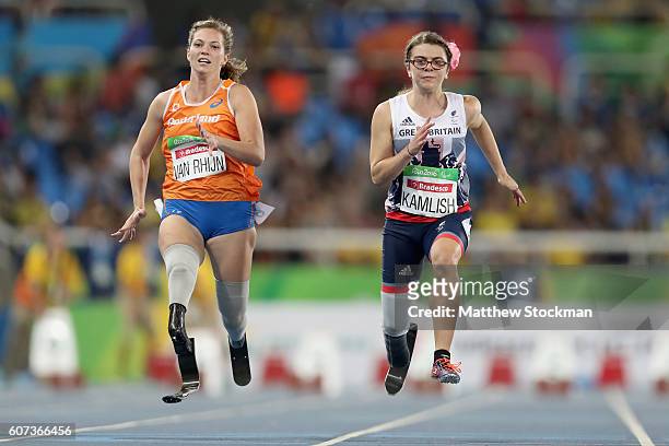 Marlou van Rhijn of the Netherlands and Sophie Kamlish of Great Britain compete at the Women's 100m - T44 Final during day 10 of the Rio 2016...